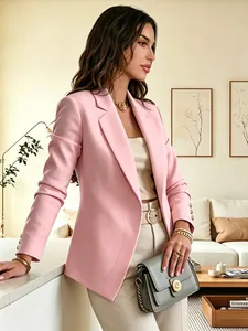 Elegant pink long-sleeved blazer with three gold buttons on cuffs shown in detail.