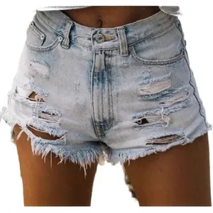 High waisted light wash denim shorts with distressed ripped detail and frayed hem