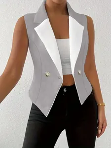 Close-up of sleeveless grey waistcoat with contrast white lapel and gold buttons