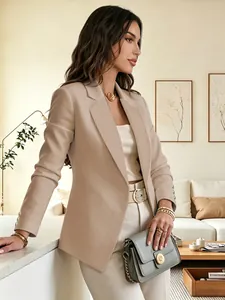 Elegant beige long sleeve blazer for women with notched lapel and cuff buttons