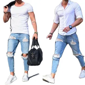 Men's light blue slim-fit ripped skinny jeans with distressed knee details for casual wear