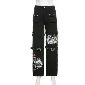 Streetwear zwarte denim broek met gespen en schedelprints voor de herfst van 2024