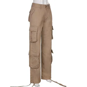 Detailed side view of vintage khaki high-waisted cargo pants with large functional pockets