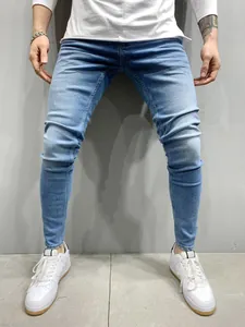 Detailed view of men's light blue stretch skinny denim jeans with a comfortable classic fit