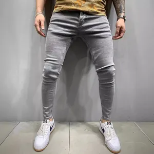 Premium men's grey stretch skinny jeans featuring a slim fit and classic pencil leg design