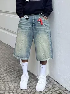 Vintage washed high street denim shorts with a loose wide-leg fit for men and women.