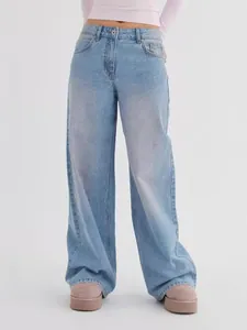 Jean femme vintage délavé bleu clair à taille haute et jambe large coupe décontractée