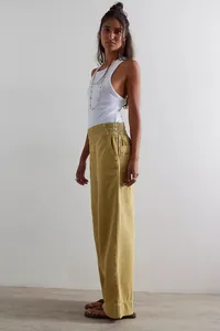 Stylish women's wide-leg olive pants with elastic waist and relaxed fit design
