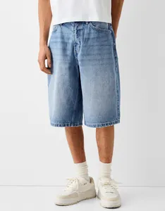 Casual men's loose fit denim shorts in light blue wash, comfortable knee-length design