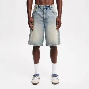 Professional studio shot of men's loose fit vintage light blue washed denim shorts