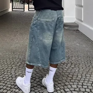 Vintage washed denim wide-leg shorts featuring a high street style and loose fit
