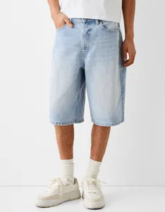 Close-up of light wash men's denim shorts in a relaxed fit for casual summer wear