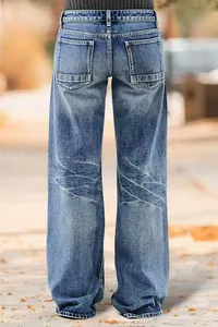 Rear view of casual straight-leg blue denim jeans for women with vintage washed effect