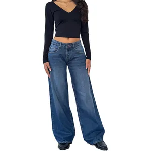 Full body view of model wearing American vintage low-waist blue washed wide-leg jeans