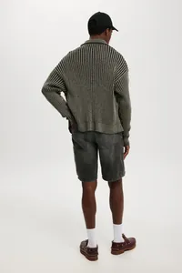 Back view of men's washed dark grey denim shorts with a relaxed fit and five-pocket design
