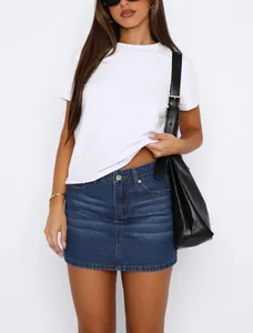 Front view of a slim fit stretch denim mini skirt with high waist design in dark blue wash