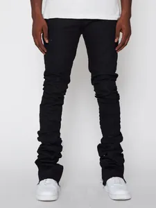 Close-up of black men's stacked denim pants featuring unique wrinkled leg design
