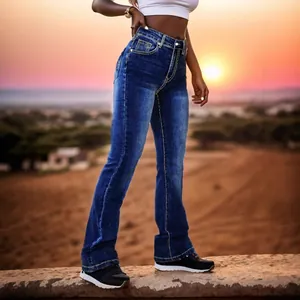 Jeans a zampa a vita bassa con ricami gialli distintivi sulle tasche posteriori per donne