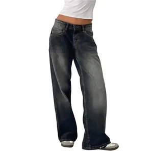 Detail shot of vintage American low-waist washed straight-leg jeans with wide-leg fit.