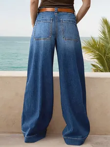 Back view of women's loose wide-leg denim jeans featuring high waist and large pockets
