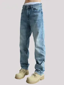 Detailed side view of men's casual straight-leg blue denim jeans in a minimalist style