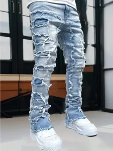 Close-up of men's high street distressed jeans with patchwork and frayed edges