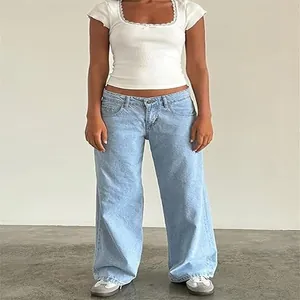 Close-up view of women's vintage low-rise wide-leg straight jeans in light wash denim blue