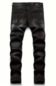 Back view of men's black slim straight jeans with distressed pockets and waist patch
