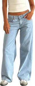 Vue détaillée d'un jean vintage à taille basse et jambes larges en délavage bleu