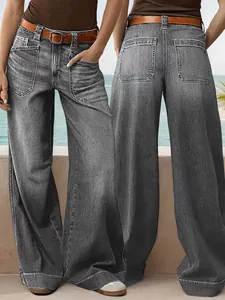 Detail view of women's loose wide-leg straight denim jeans from front and back