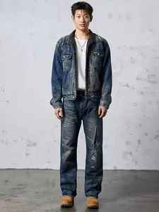 Model wearing vintage distressed wide-leg straight denim jeans in a full-length shot