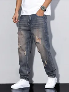 Men's loose fit ripped straight-leg jeans in light wash denim streetwear style