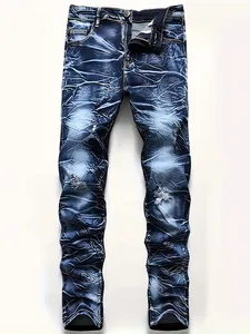 Detail of men's slim fit blue jeans featuring unique white crinkled wash and distressed rips.