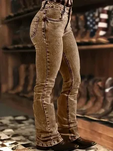 Side view of vintage acid washed slim straight denim pants for women in rustic setting