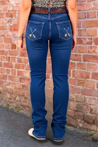 Detailed back view of slim fit flare jeans with unique arrow embroidery on pockets