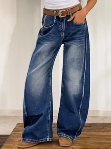 Trendy women's vintage blue wide leg curved denim jeans with a relaxed baggy fit style