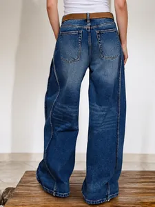 Women's blue wide-leg curved jeans with a relaxed fit and back pocket detail
