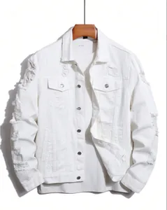Close-up showing the ripped texture and heavy distressed details on white denim jacket