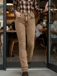 Women's vintage washed brown straight leg denim jeans featuring a high-waisted slim fit