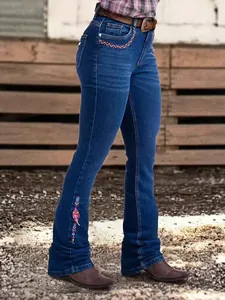 Stylish women's slim fit flare jeans with colorful embroidery on the pocket and hem