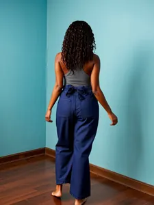 Rear view of stylish dark blue wide-leg Tencel trousers with back waist bow detail