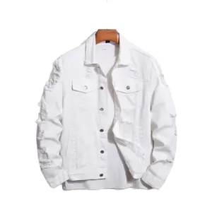Detail view of a men's white distressed denim jacket with ripped accents and metal buttons.