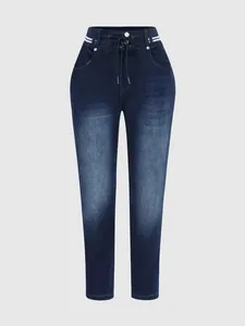 Jean slim bleu foncé à taille haute avec cordon de serrage et détail rayé blanc