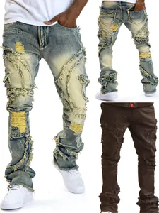 Close-up view of distressed flared men's jeans featuring unique fringe and ripped accents