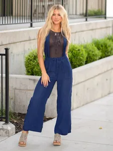 Stylish blue Tencel wide-leg bib overalls with loose straight fit for women outdoors