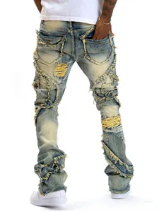 Back view of distressed flared denim jeans with heavy fringe and tassel detailing