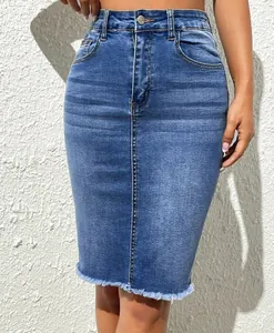 Detailed macro view showing the raw hem fringe and stretch denim texture of the high-waist skirt