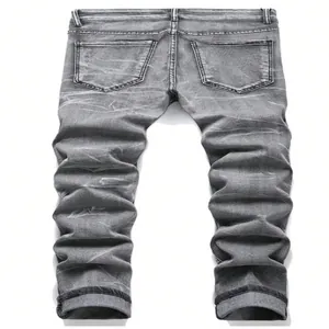 Back view of men's distressed grey straight-leg denim jeans with unique washed texture finish.
