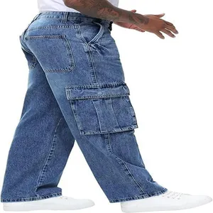 Side profile of men's loose blue cargo denim pants featuring large utility pockets