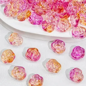 Close-up detail of translucent pink rose glass beads for DIY jewelry making accessories